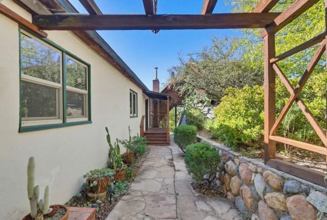a bedroom with bed and window
