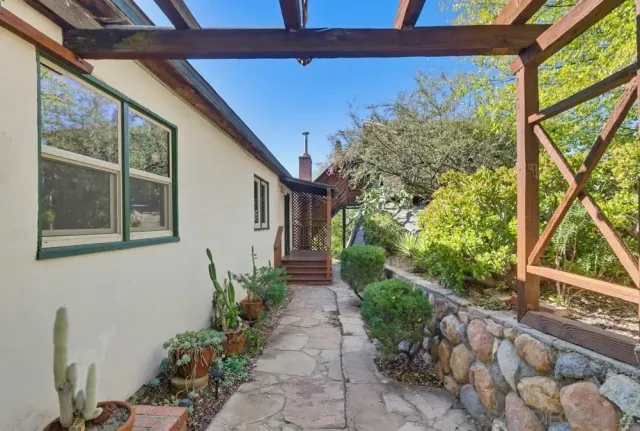 a view of a room with wooden walls