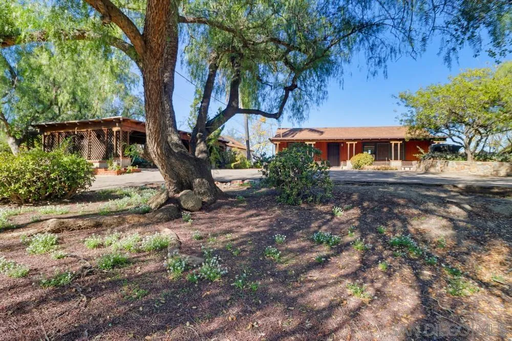 602 Starbright Lane Alpine, CA 91901 - Photo 2 of 73 a front view of a house with a yard