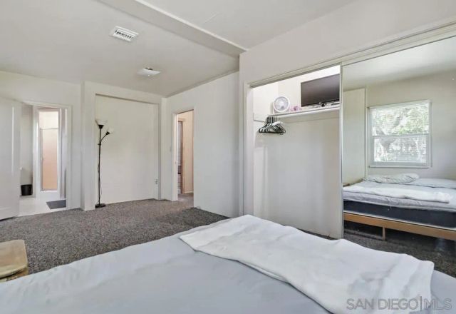 a view of a room with wooden walls