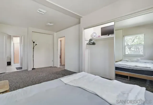 a view of a room with wooden walls