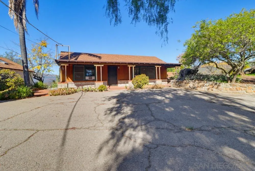 602 Starbright Lane Alpine, CA 91901 - Photo 43 of 73 a front view of house with yard and trees around