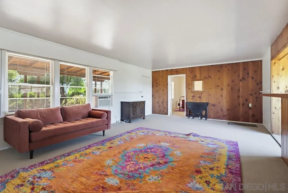 602 Starbright Lane Alpine, CA 91901 - Photo 48 of 73 a living room with furniture and a fireplace