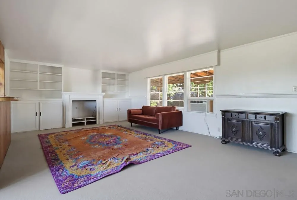 602 Starbright Lane Alpine, CA 91901 - Photo 49 of 73 a living room with furniture and a fireplace