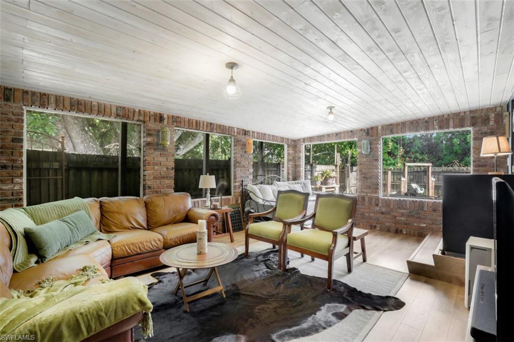 9520 Corkscrew Road Estero, FL 33928 - Photo 23 of 27 Once a carport, this bonus space has 367sqft and can double as a guest room, office, or add a bathroom/kitchenette to rent out.