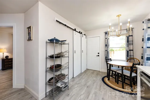 a view of a kitchen and dining room