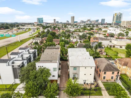 an aerial view of a city with lots of residential buildings