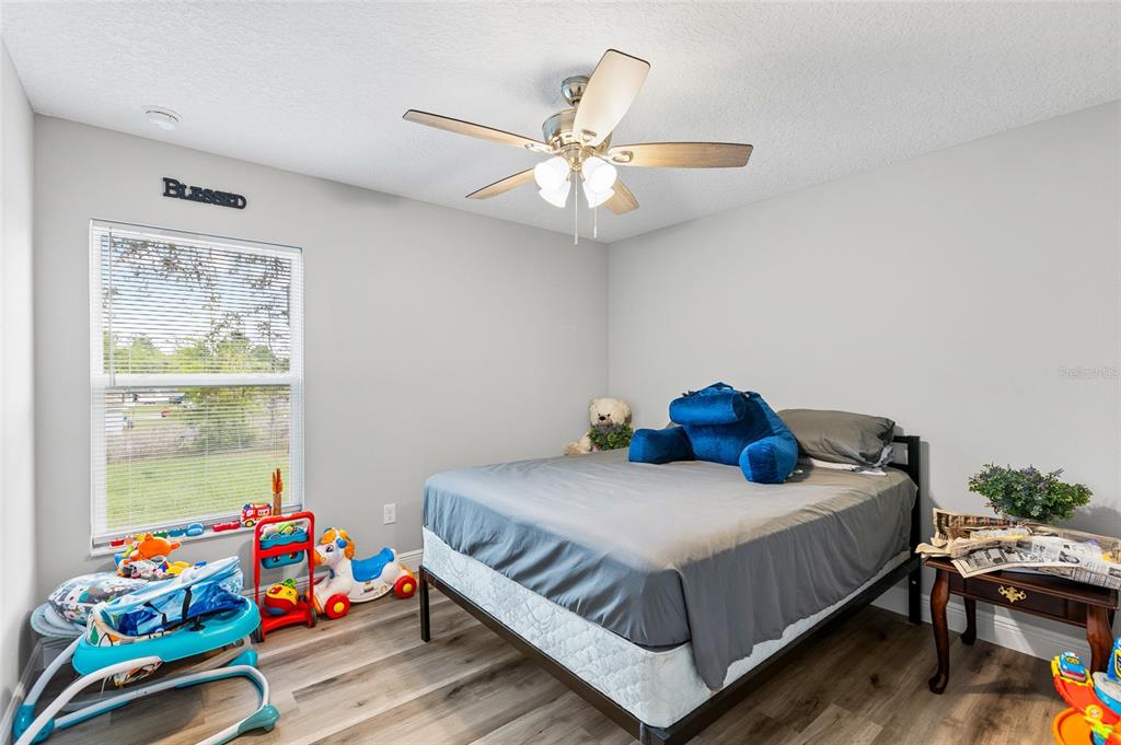 2700 West Rutland Drive Citrus Springs, FL 34434 - Photo 20 of 31 a bedroom with a bed and window