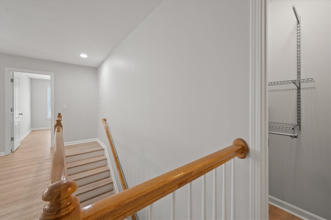 100 Shipyard Circle Anderson, SC 29621 - Photo 32 of 40 This interior hallway features sleek flooring and a built-in closet, offering practical living.