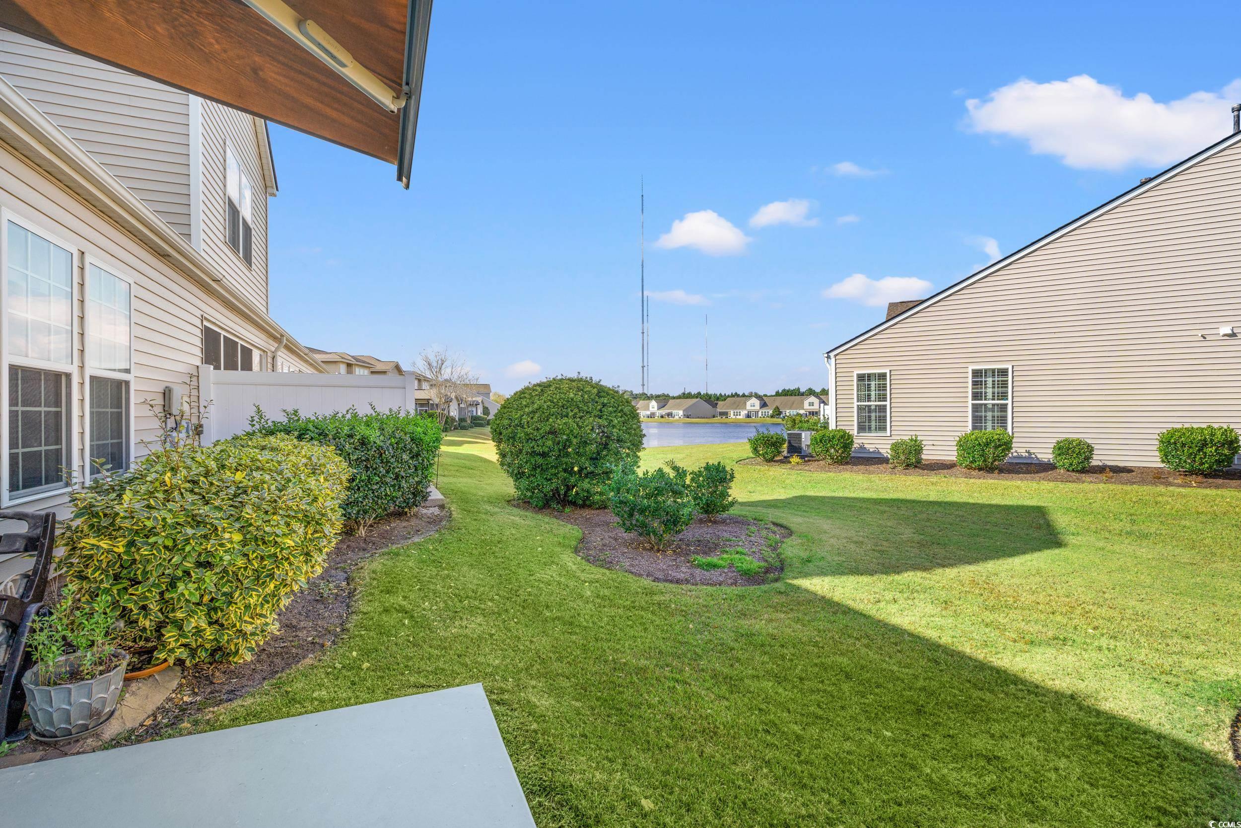 135 Parmelee Drive, Unit C Murrells Inlet, SC 29576 - Photo 29 of 37 View of grassy yard