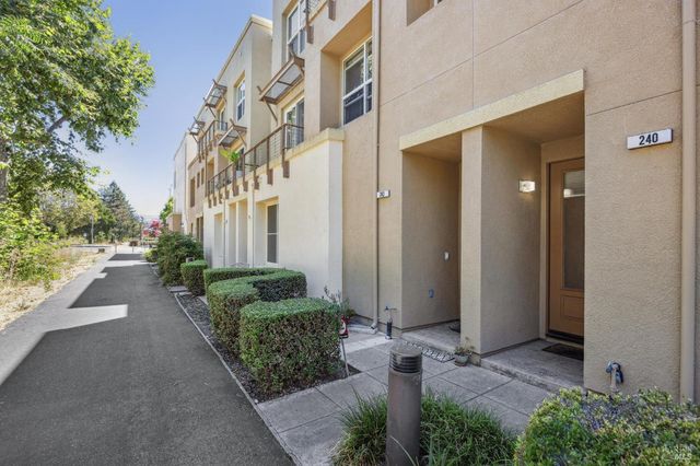 a view of a house with a street