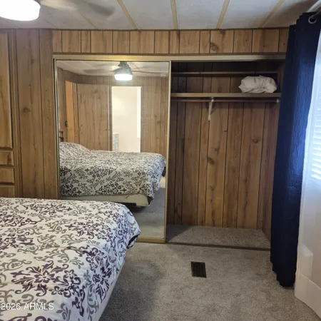 a view of a hallway with closet area