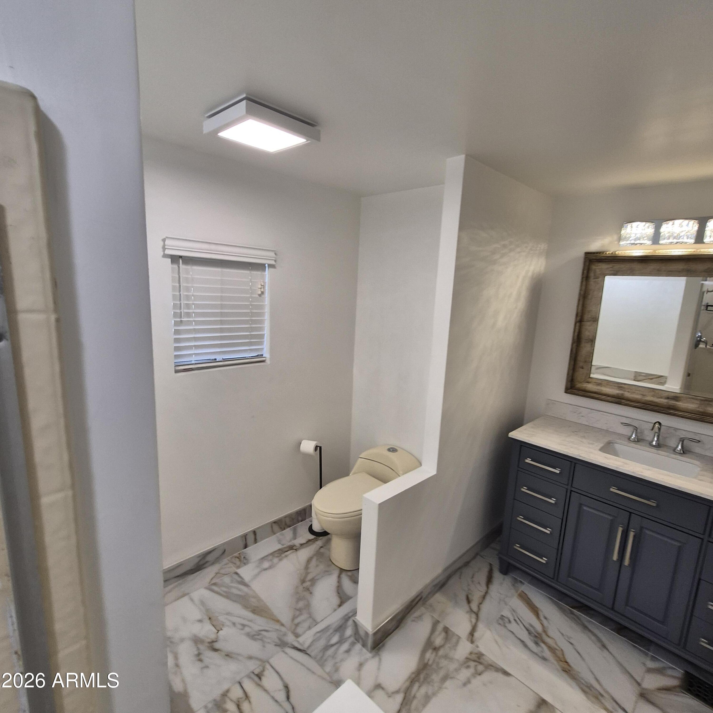 245 South 56th Street, Unit 75 Mesa, AZ 85206 - Photo 36 of 50 Master toilet