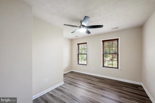 a kitchen with a stove and a microwave