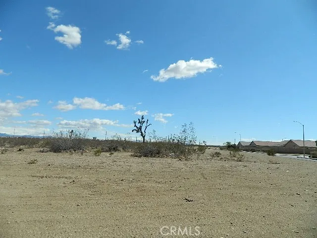 0 Palmdale Road Adelanto, CA 92301 - Photo 13 of 19 a view of a lake with a beach