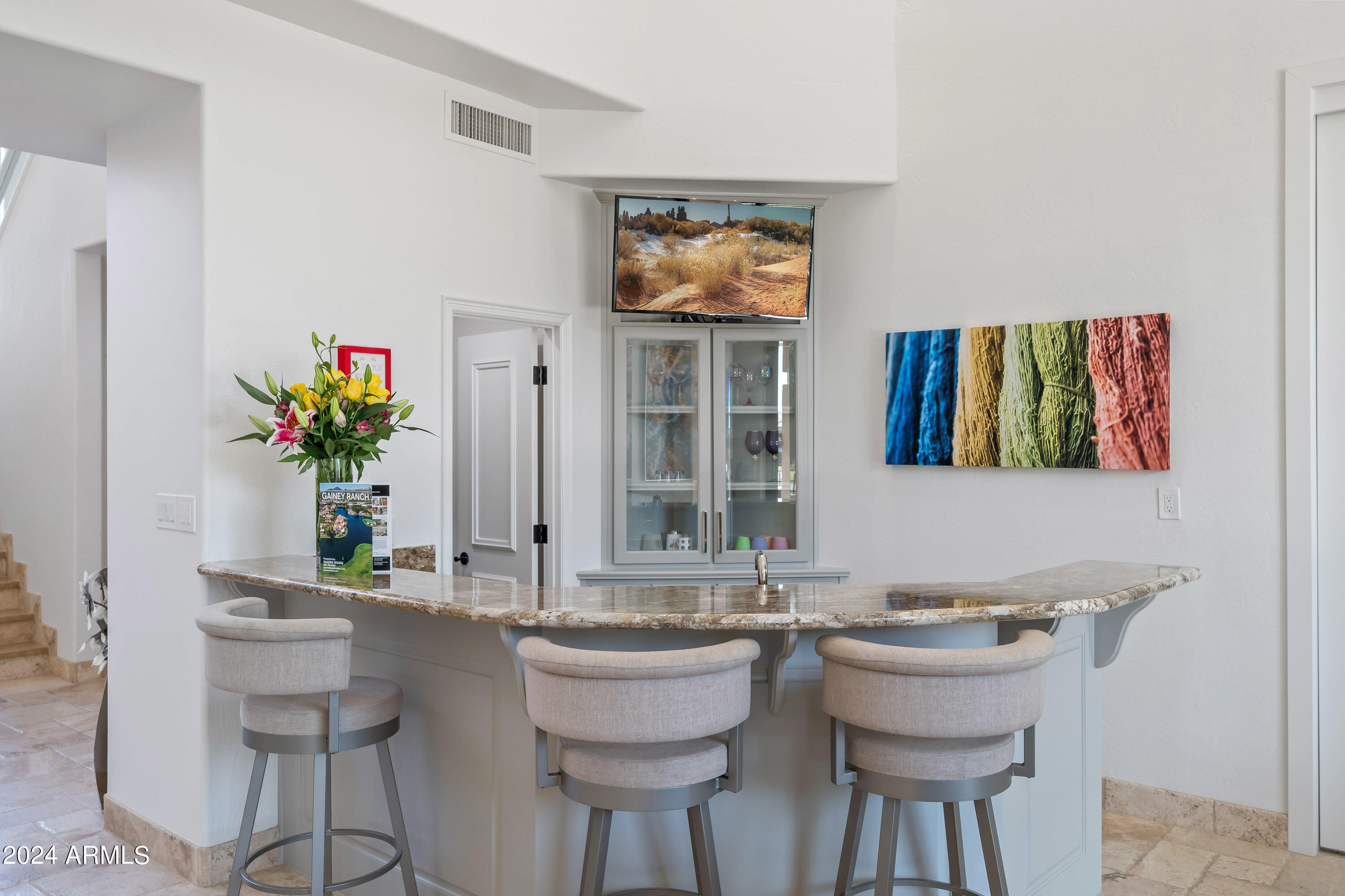 7323 East Gainey Ranch Road, Unit 4 Scottsdale, AZ 85258 - Photo 20 of 67 Wet Bar with Seating