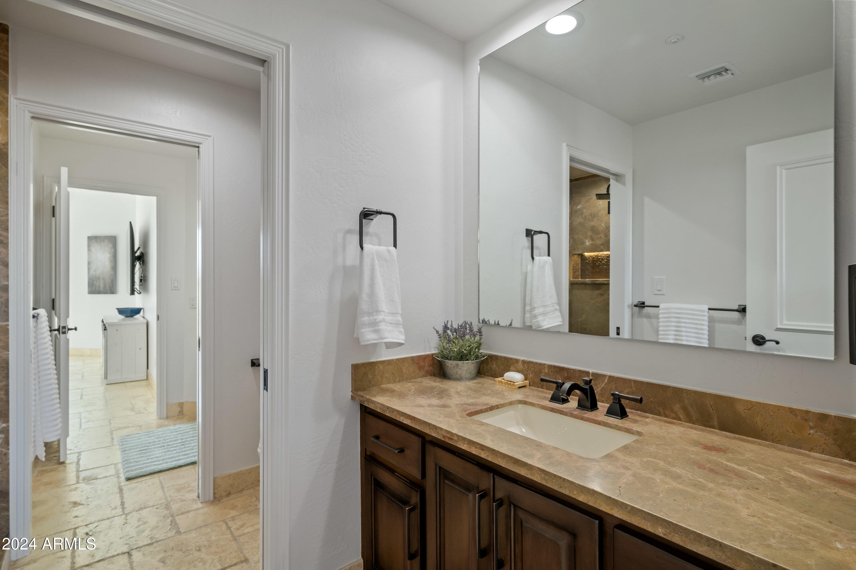 7323 East Gainey Ranch Road, Unit 4 Scottsdale, AZ 85258 - Photo 46 of 67 Jack & Jill Bathroom Upstairs