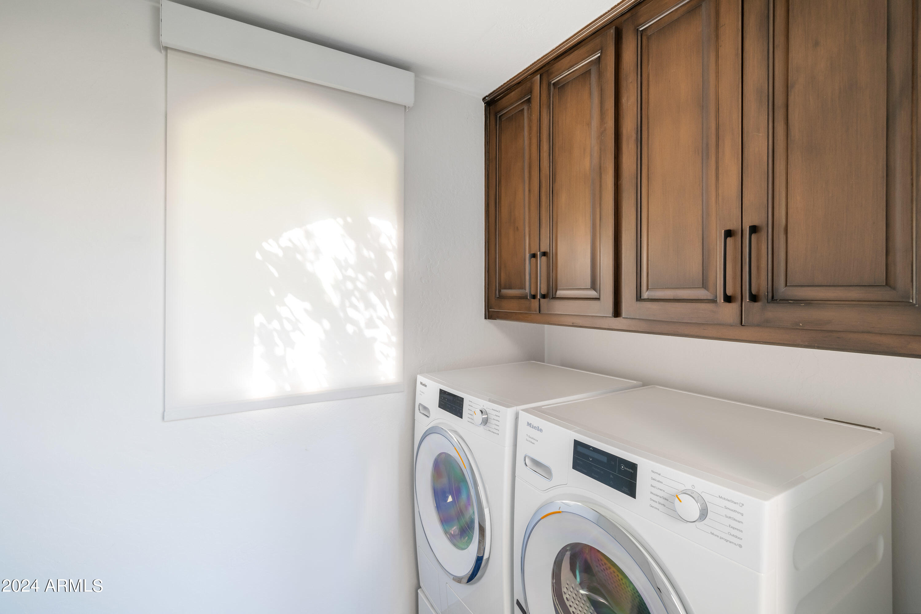 7323 East Gainey Ranch Road, Unit 4 Scottsdale, AZ 85258 - Photo 53 of 67 Laundry on Main Level