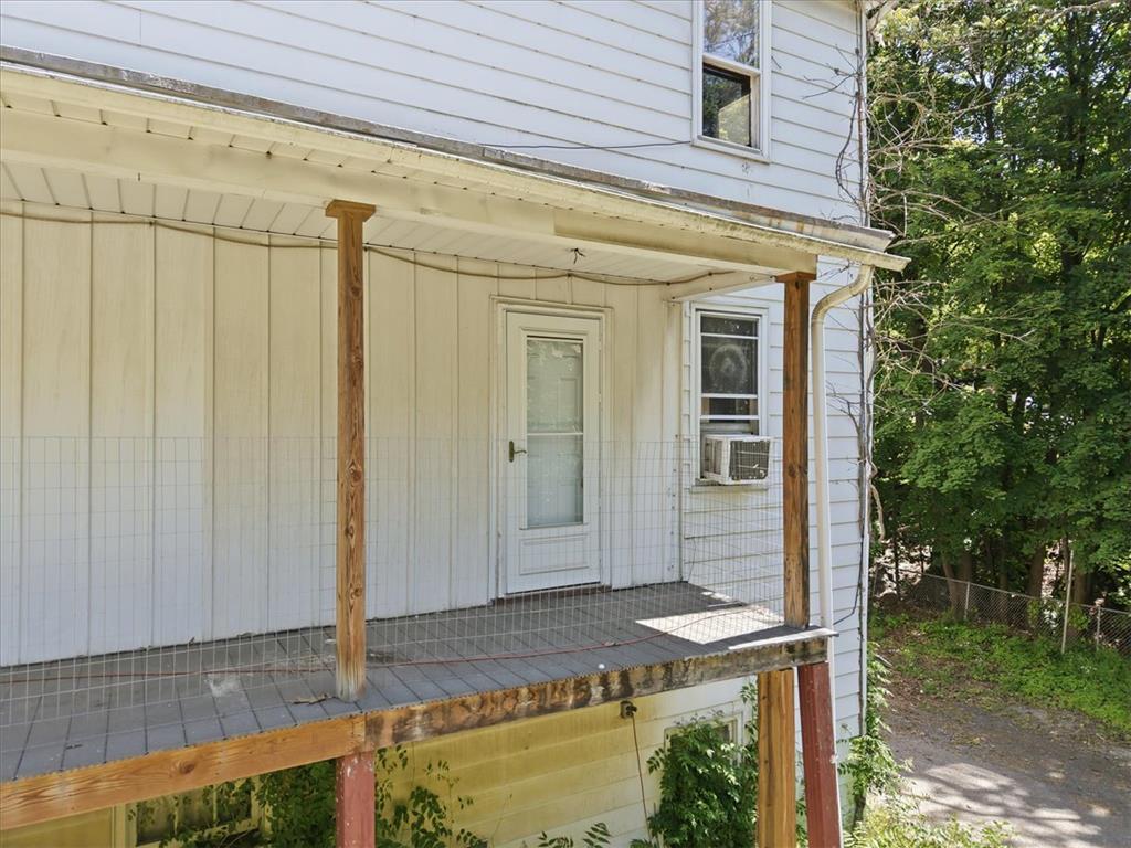 167 Main Road Lehighton, PA 18235 - Photo 37 of 41 A classic porch with simple wood supports offers a welcoming entrance to this home.