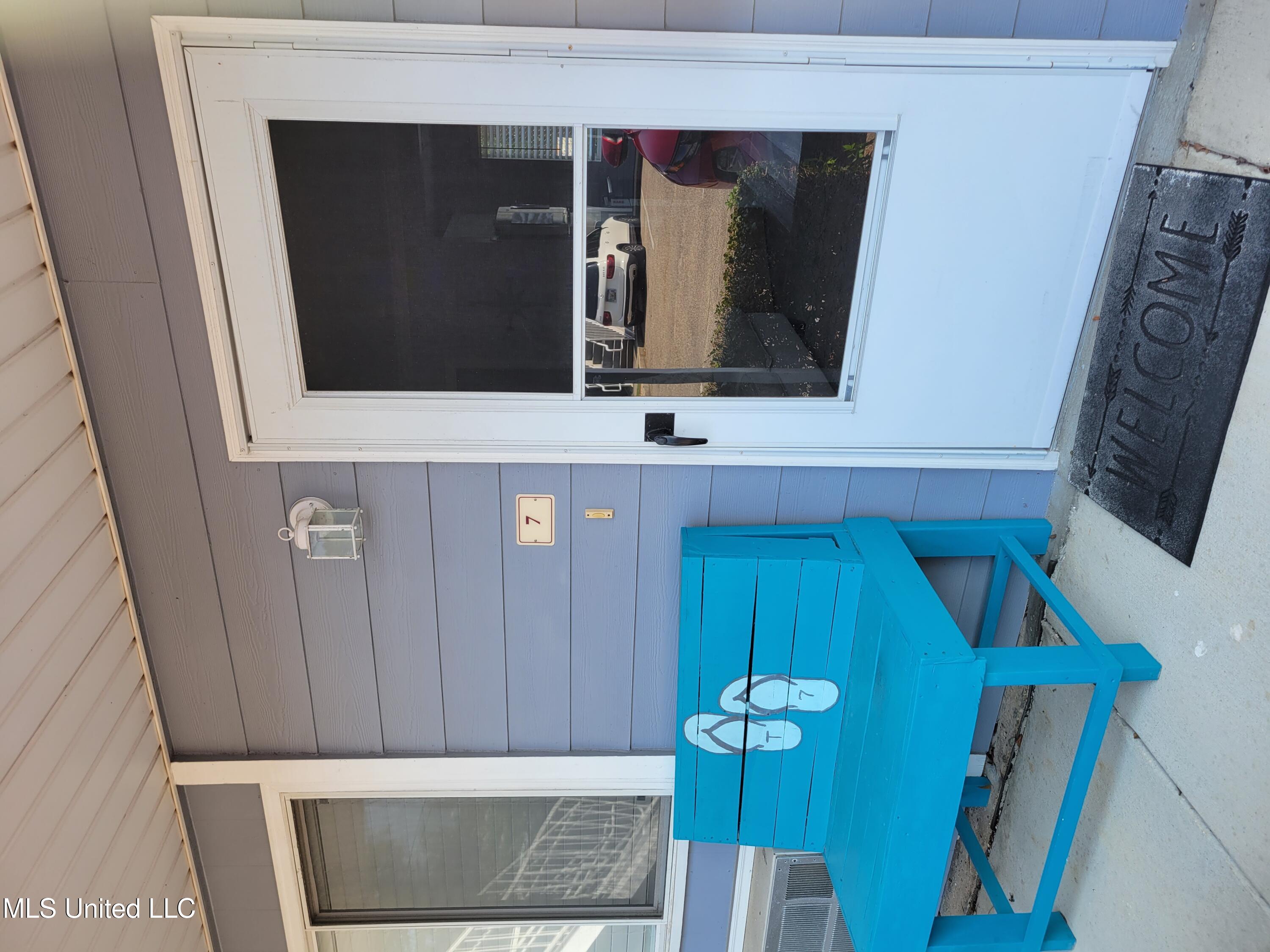 1664 Beach Boulevard, Unit 7 Biloxi, MS 39531 - Photo 1 of 7 fron