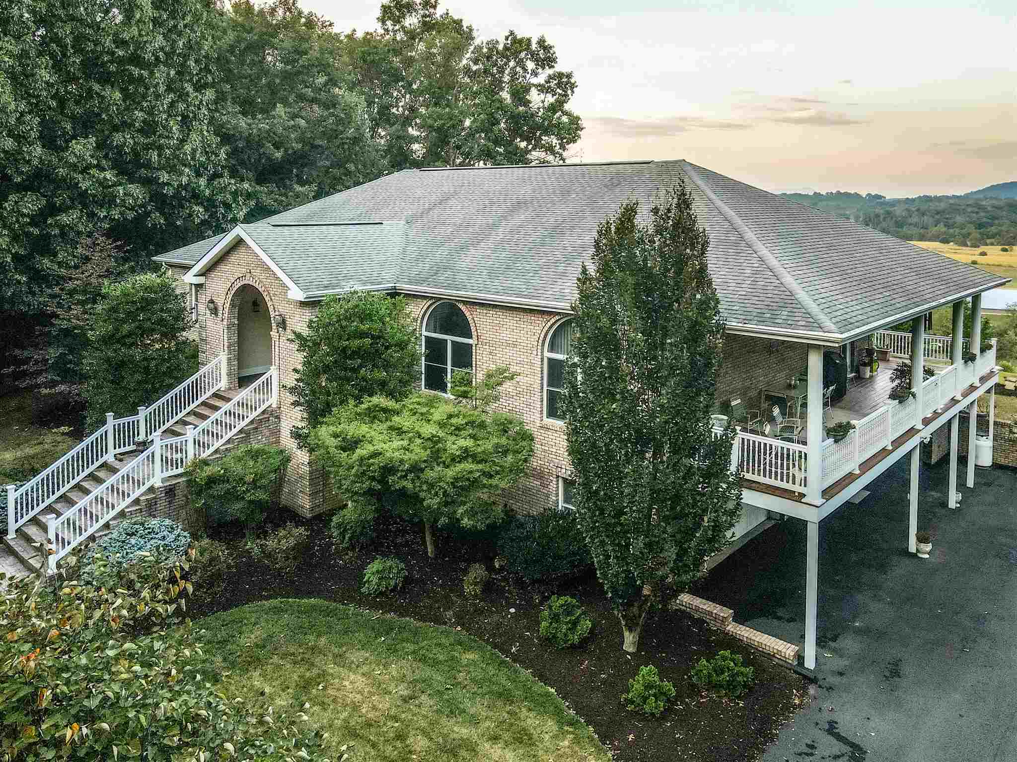 6403 Spring Hill Road Bridgewater, VA 22812 - Photo 1 of 52 a aerial view of house with a yard and large trees