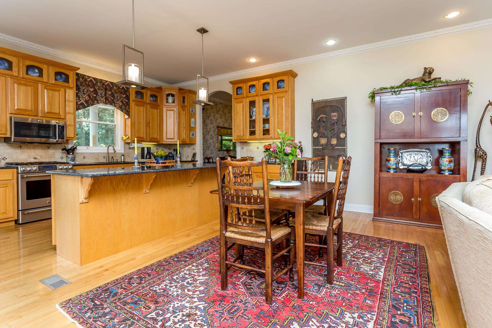 6403 Spring Hill Road Bridgewater, VA 22812 - Photo 14 of 52 a dining table chairs and a coffee table
