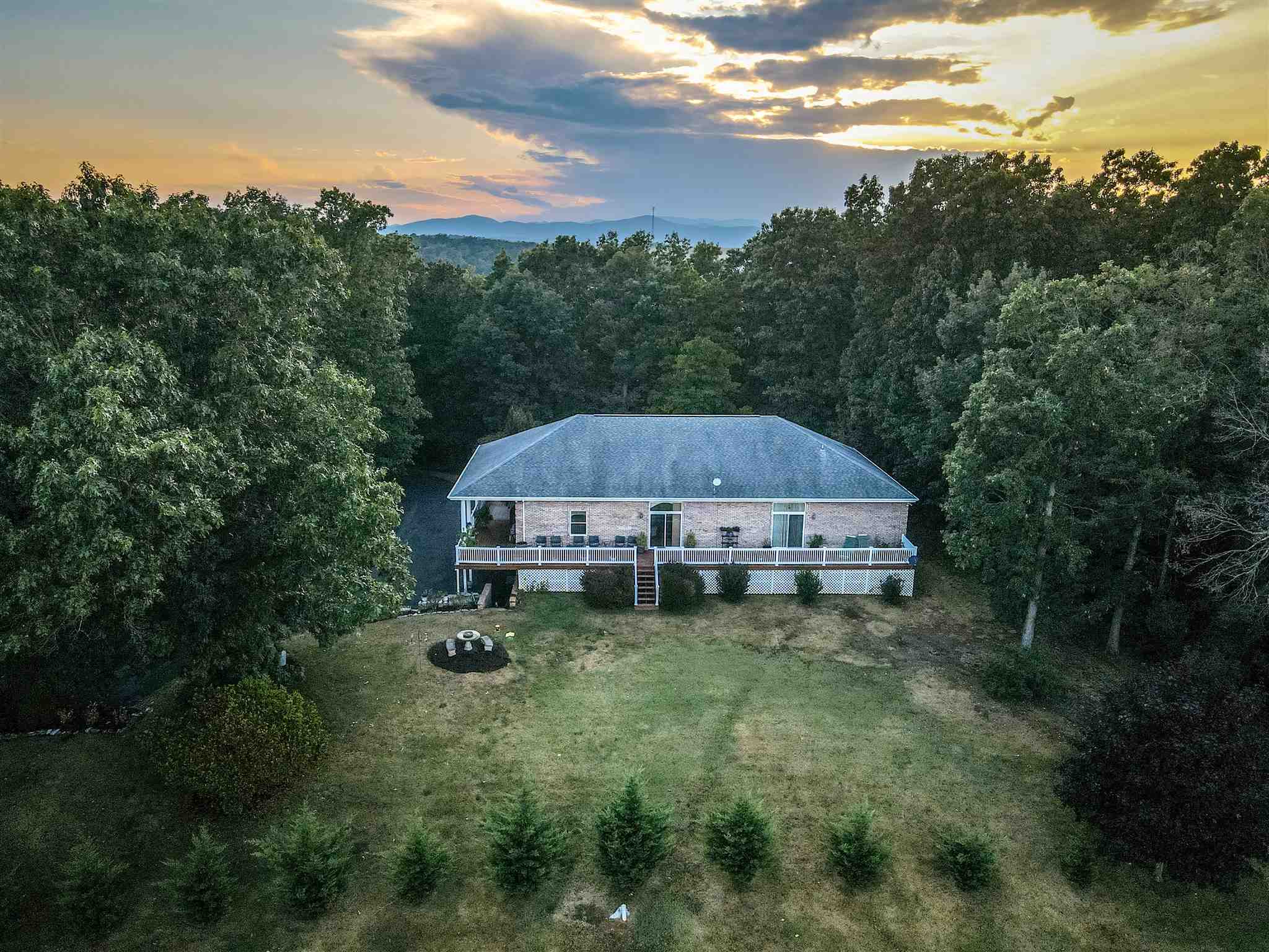 6403 Spring Hill Road Bridgewater, VA 22812 - Photo 50 of 52 a view of a house with a yard and sitting area