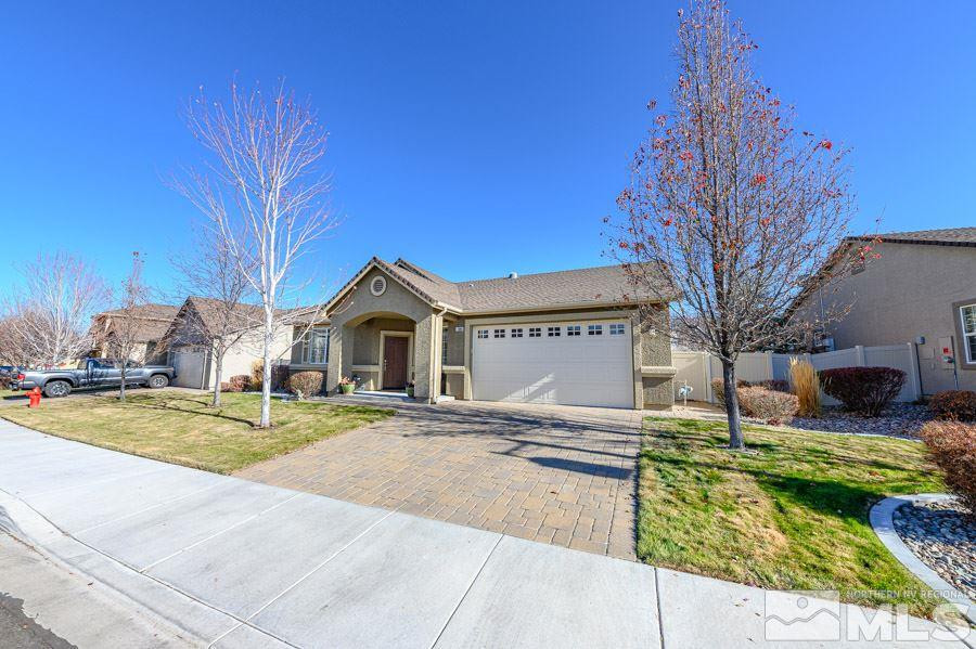 11048 Colton Drive Reno, NV 89521 - Photo 3 of 23 a view of a house with a big yard and large tree