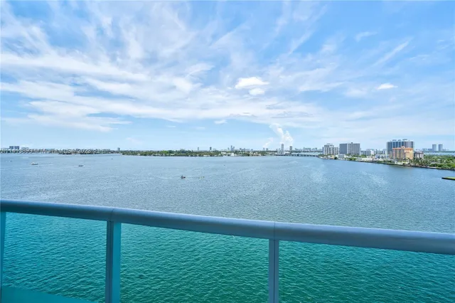 a view of a chairs and table in patio of the house