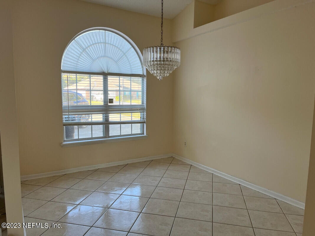 2805 Unison Court Middleburg, FL 32068 - Photo 3 of 6 a view of an empty room with a window