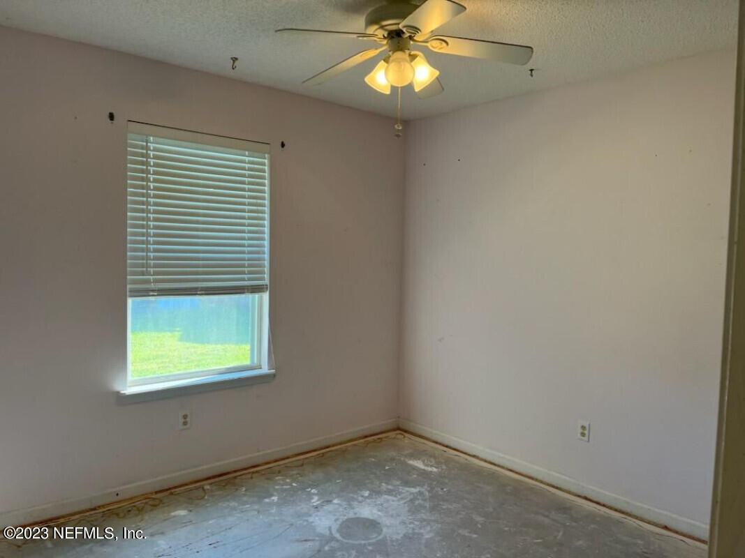 2805 Unison Court Middleburg, FL 32068 - Photo 5 of 6 an empty room with a window
