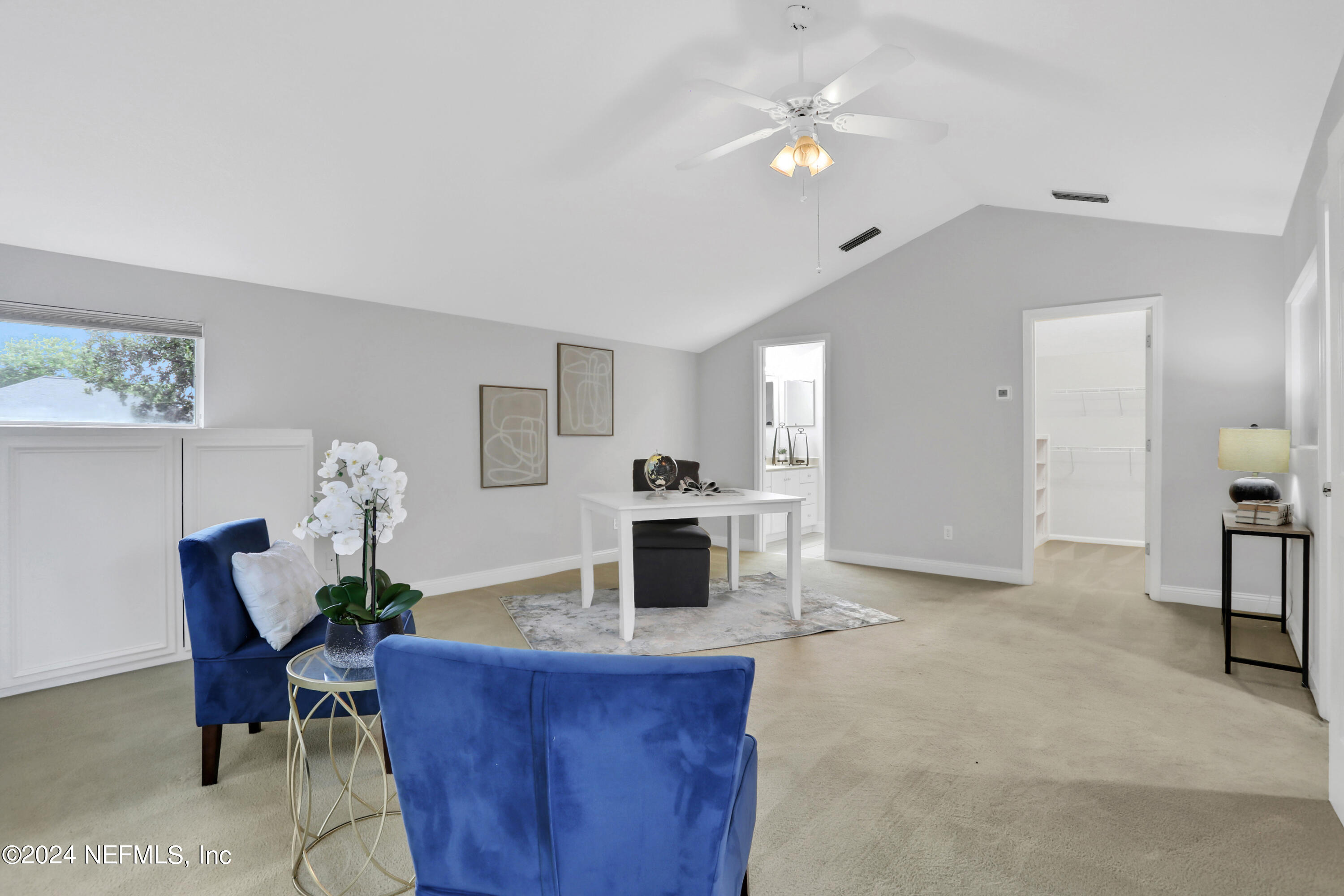 14566 Marsh View Drive Jacksonville, FL 32250 - Photo 20 of 26 a living room with furniture and a fireplace