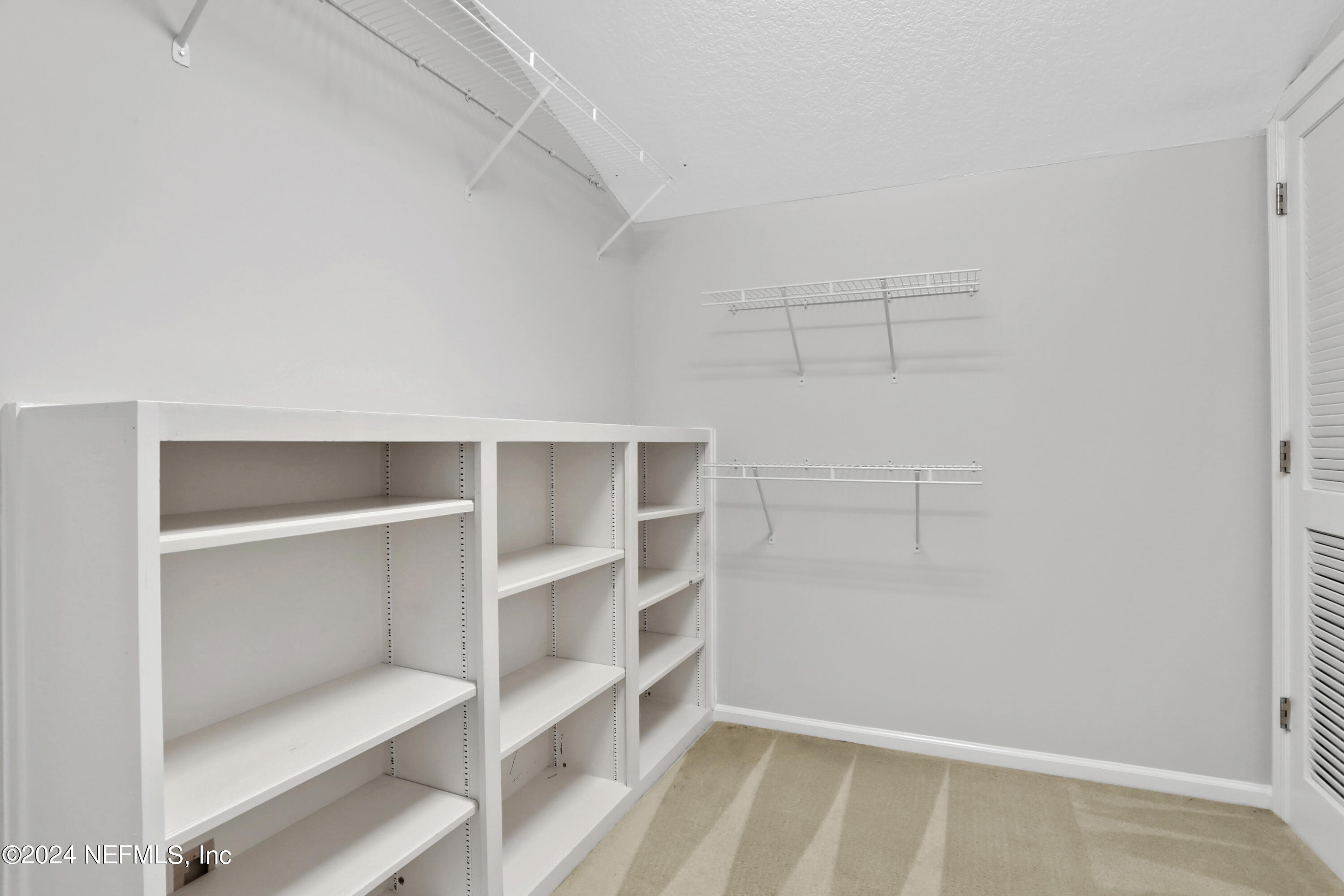 14566 Marsh View Drive Jacksonville, FL 32250 - Photo 21 of 26 a view of an empty walk in closet