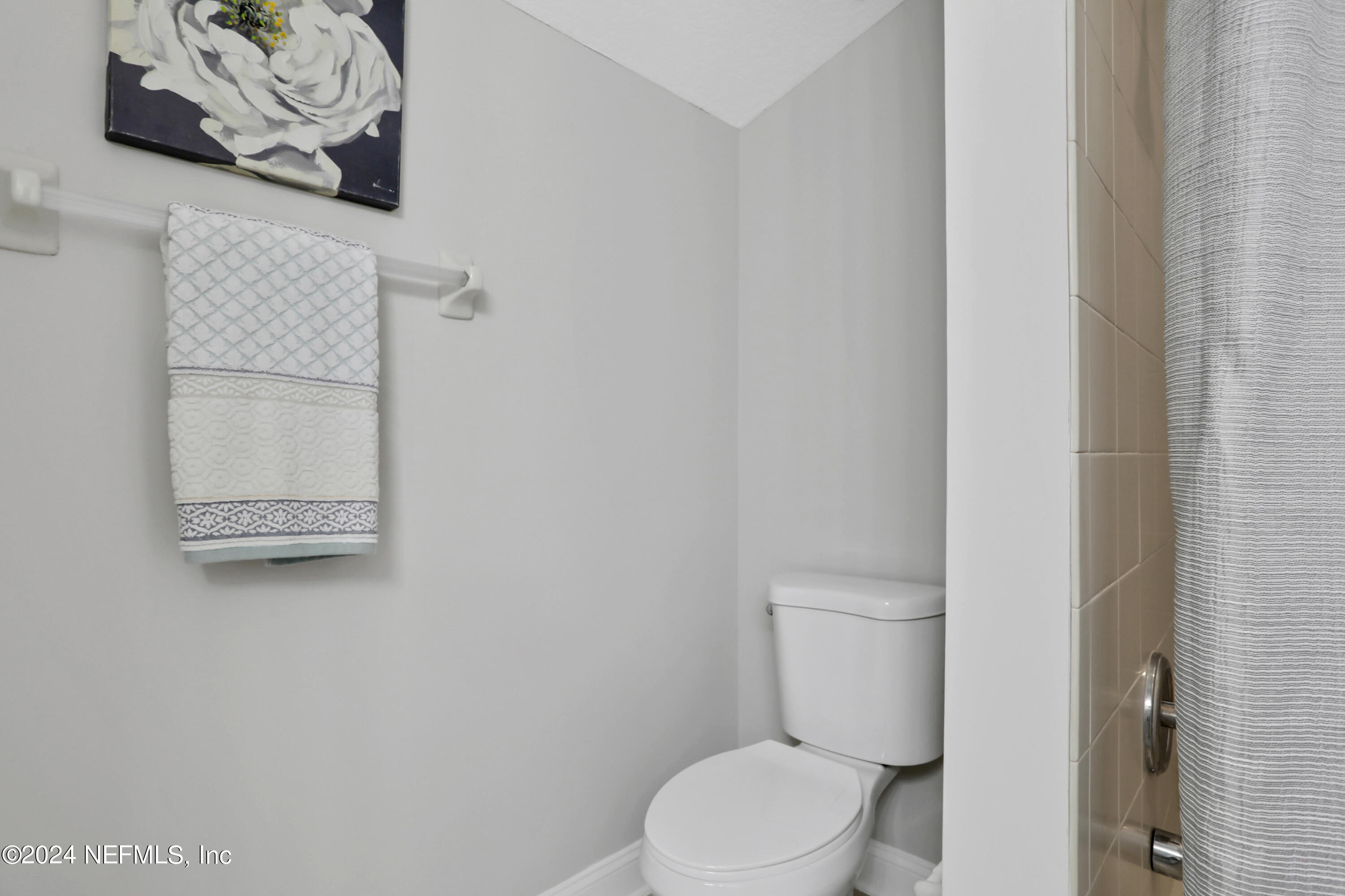 14566 Marsh View Drive Jacksonville, FL 32250 - Photo 24 of 26 a white toilet sitting next to a white wall