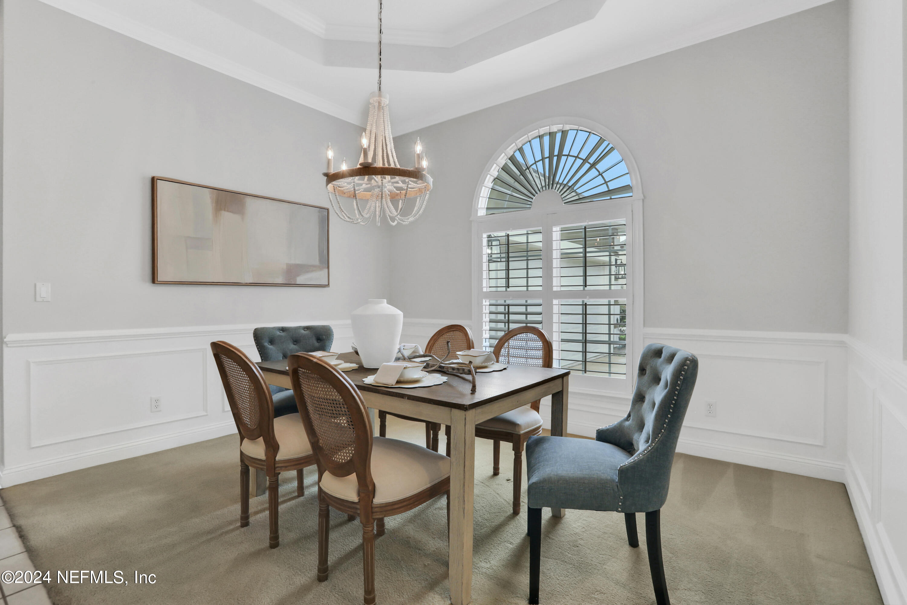14566 Marsh View Drive Jacksonville, FL 32250 - Photo 5 of 26 a view of a dining room with furniture window and wooden floor