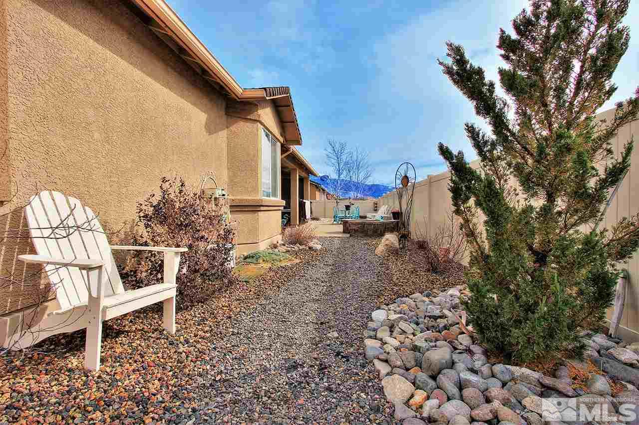 9655 Aidan Way Reno, NV 89521 - Photo 23 of 25 a view of a backyard with sitting area