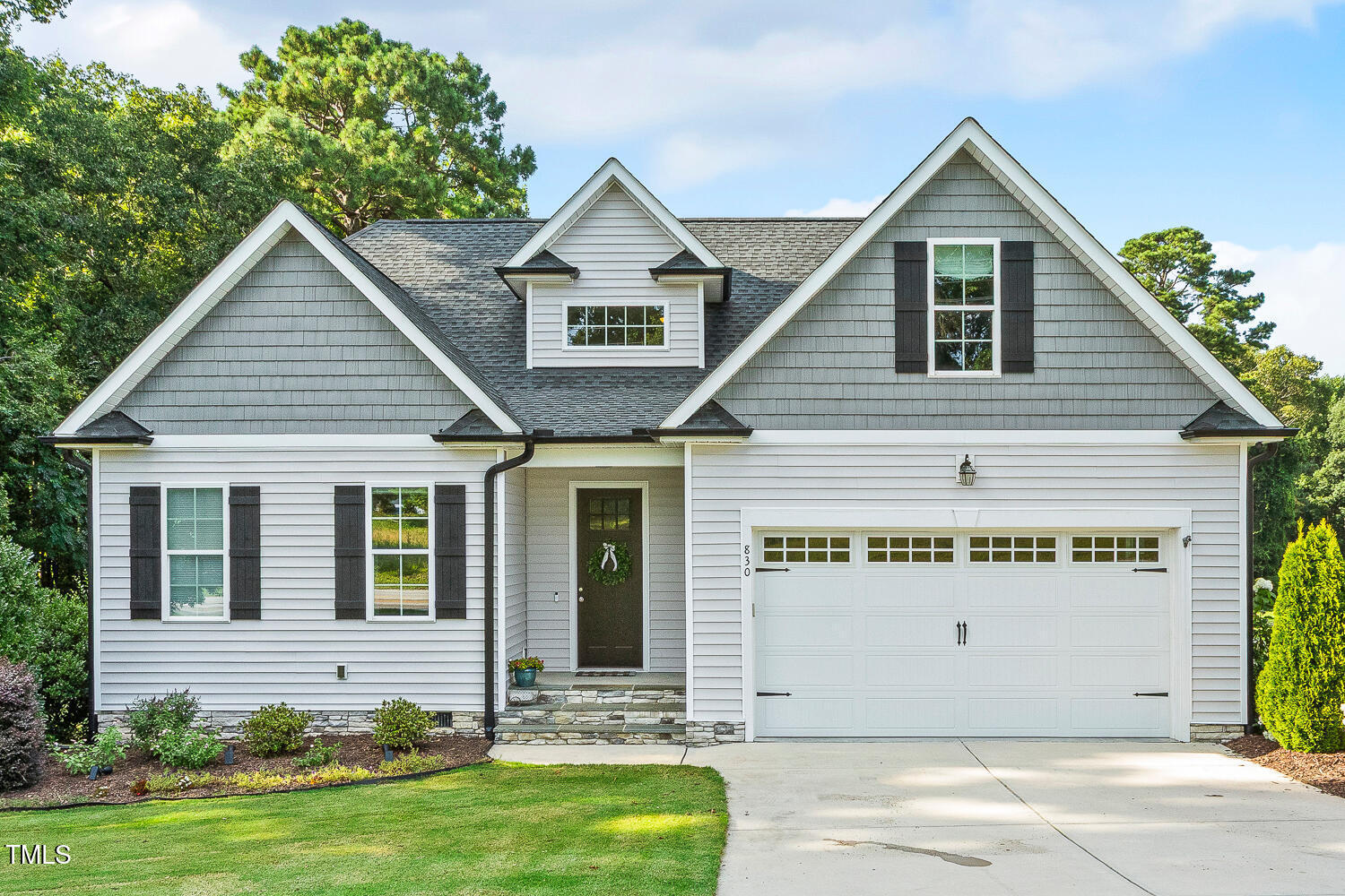 830 Wilbon Road Holly Springs, NC 27540 - Photo 1 of 60 a view of a house with yard