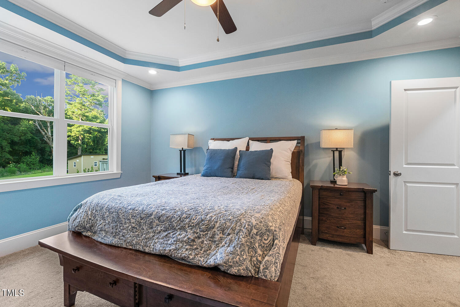 830 Wilbon Road Holly Springs, NC 27540 - Photo 28 of 60 a bedroom with a bed and a window