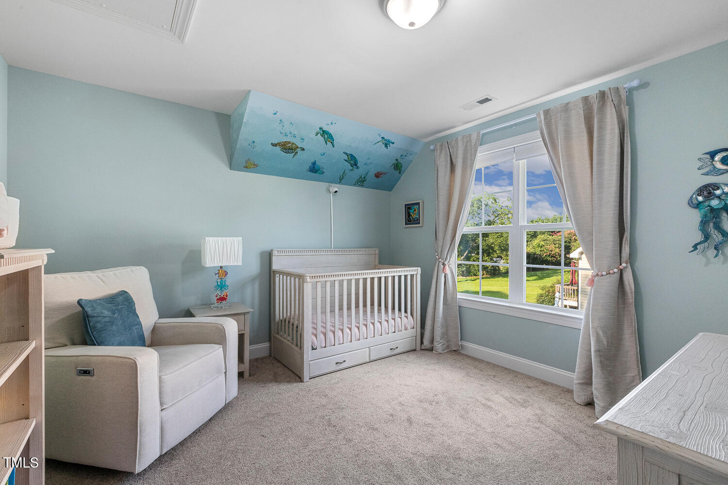 830 Wilbon Road Holly Springs, NC 27540 - Photo 41 of 60 a living room with furniture and a window