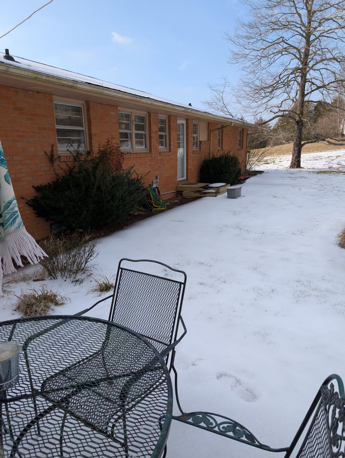 1360 Harris Hollow Road Charlotte, TN 37036 - Photo 14 of 18 a backyard of a house with garden and patio