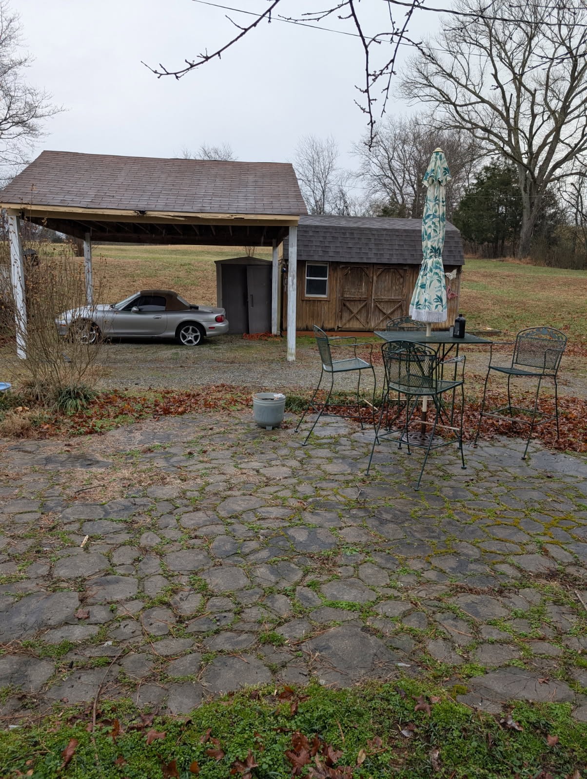 1360 Harris Hollow Road Charlotte, TN 37036 - Photo 16 of 18 a front view of a house with a yard