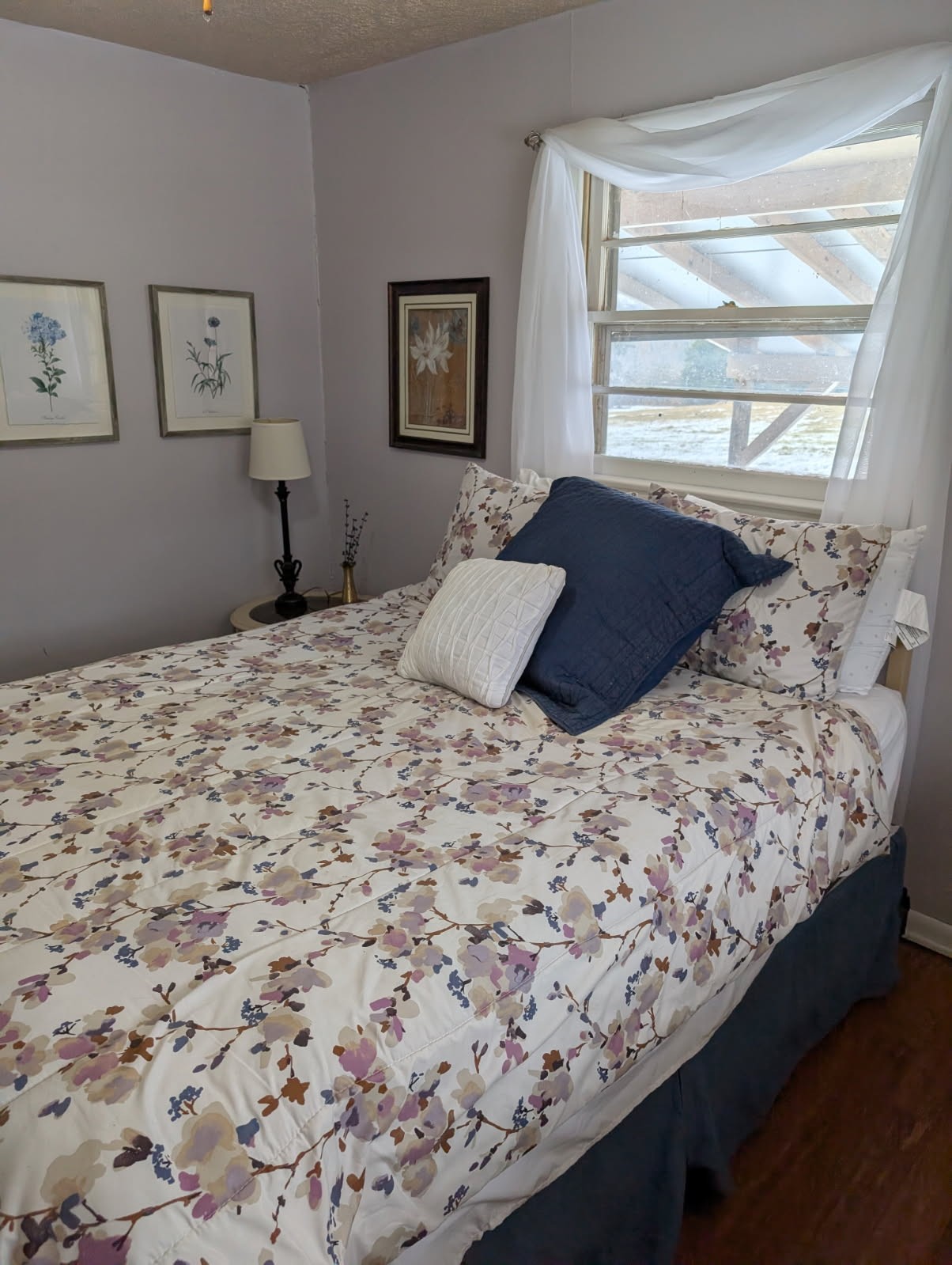 1360 Harris Hollow Road Charlotte, TN 37036 - Photo 9 of 18 a bedroom with a bed and window