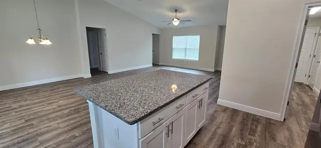 an entryway with chandelier