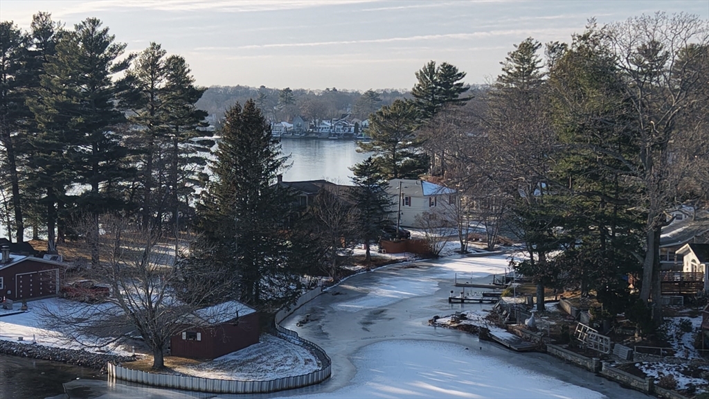 10 Indian Point Road Webster, MA 01570 - Photo 6 of 12 a view of a house with a yard from a lake