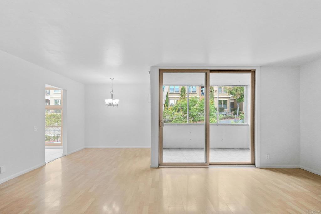 4891 Collwood Boulevard, Unit B San Diego, CA 92115 - Photo 15 of 34 a view of an empty room with glass door