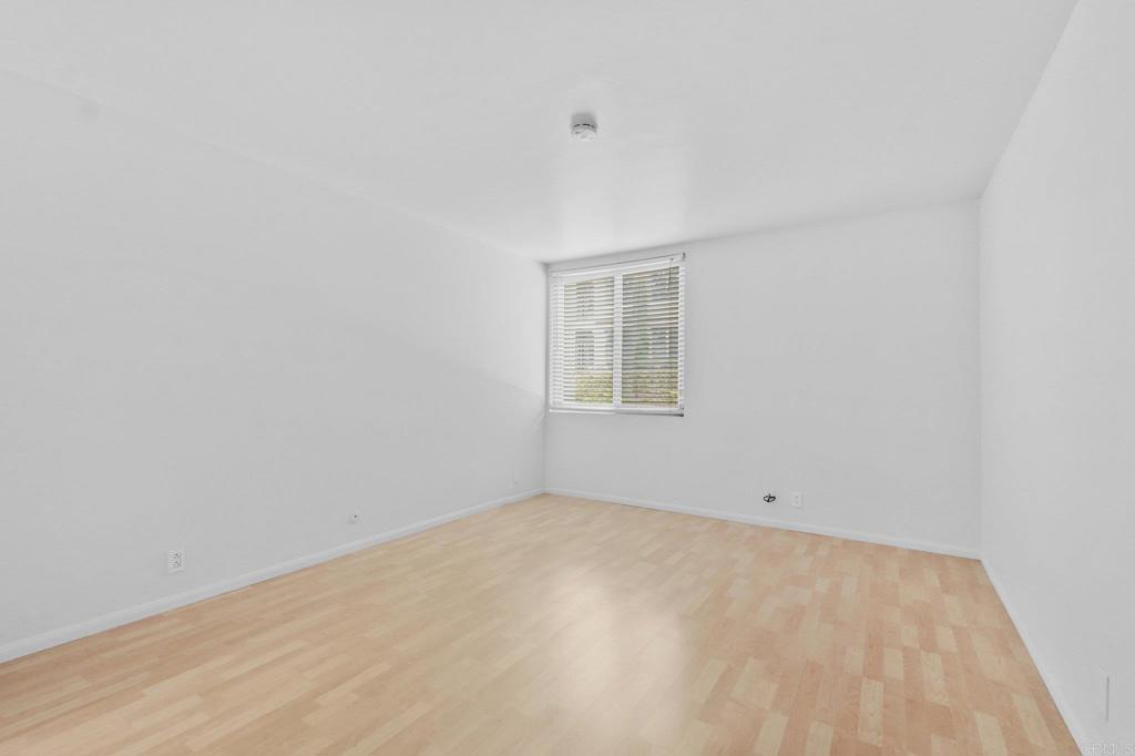 4891 Collwood Boulevard, Unit B San Diego, CA 92115 - Photo 4 of 34 an empty room with a window