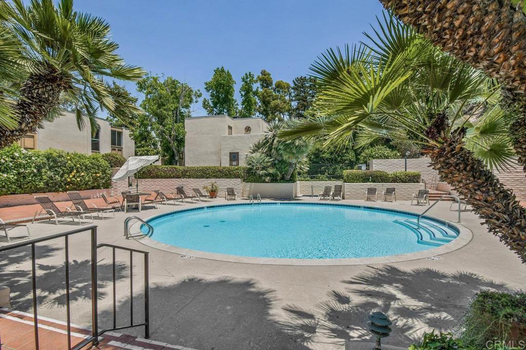 4891 Collwood Boulevard, Unit B San Diego, CA 92115 - Photo 9 of 34 a view of a swimming pool with a patio