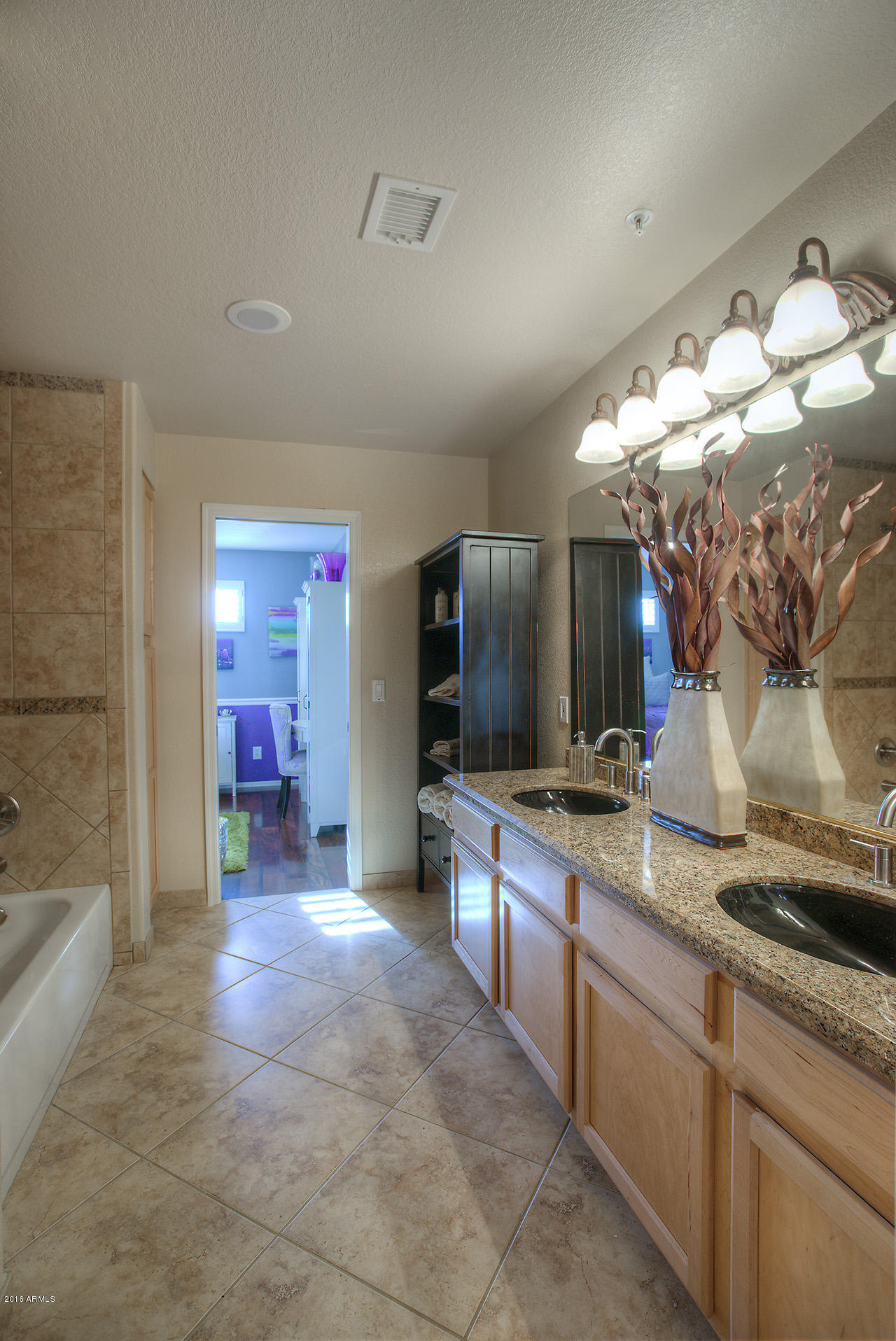 7532 East Alameda Road Scottsdale, AZ 85255 - Photo 21 of 27 a large bathroom with a sink and a large mirror