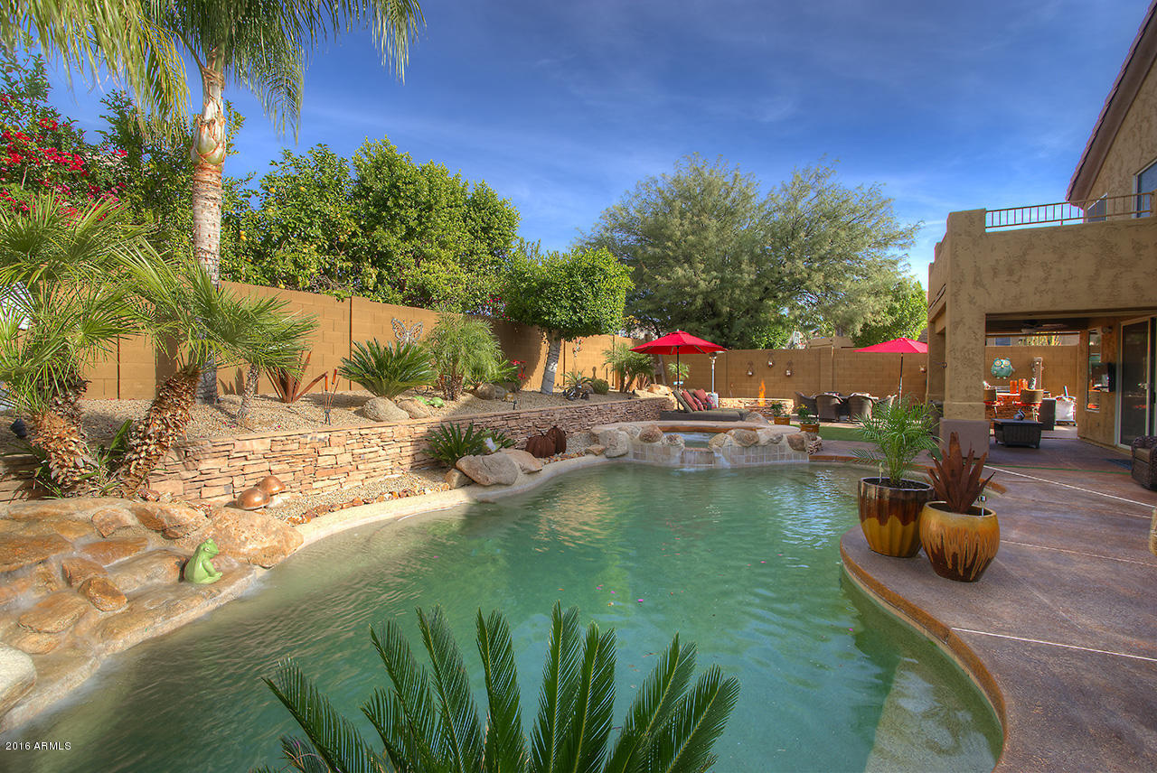 7532 East Alameda Road Scottsdale, AZ 85255 - Photo 25 of 27 a view of a swimming pool with a patio