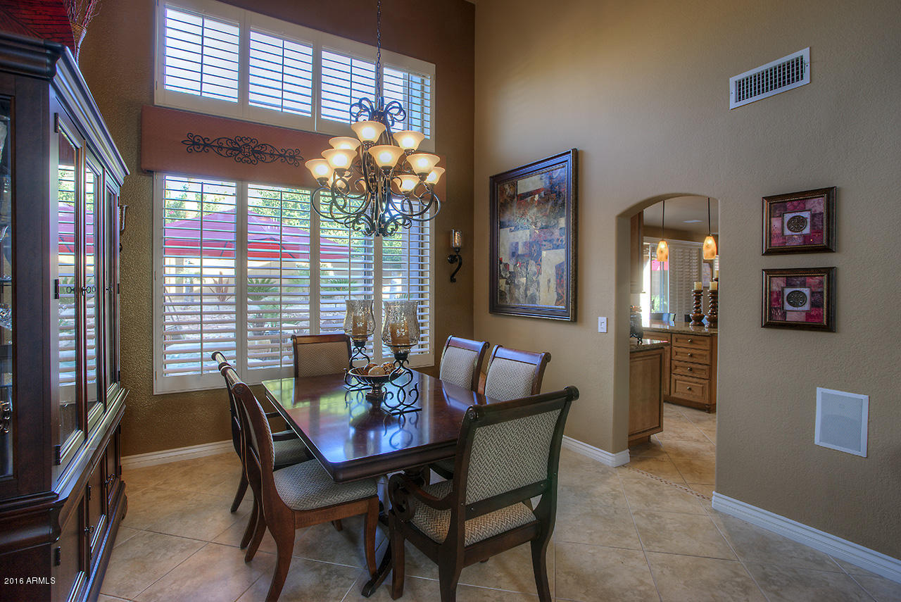 7532 East Alameda Road Scottsdale, AZ 85255 - Photo 4 of 27 a dining room with furniture and window